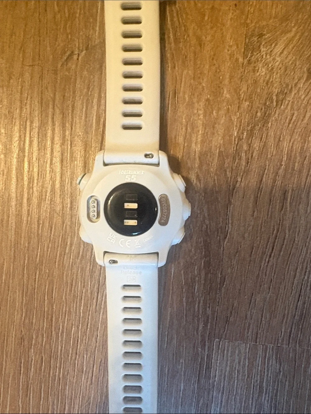 garmin white fitness GPS smartwatch with silicone strap